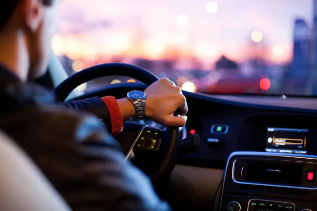 car dashboard at sunset